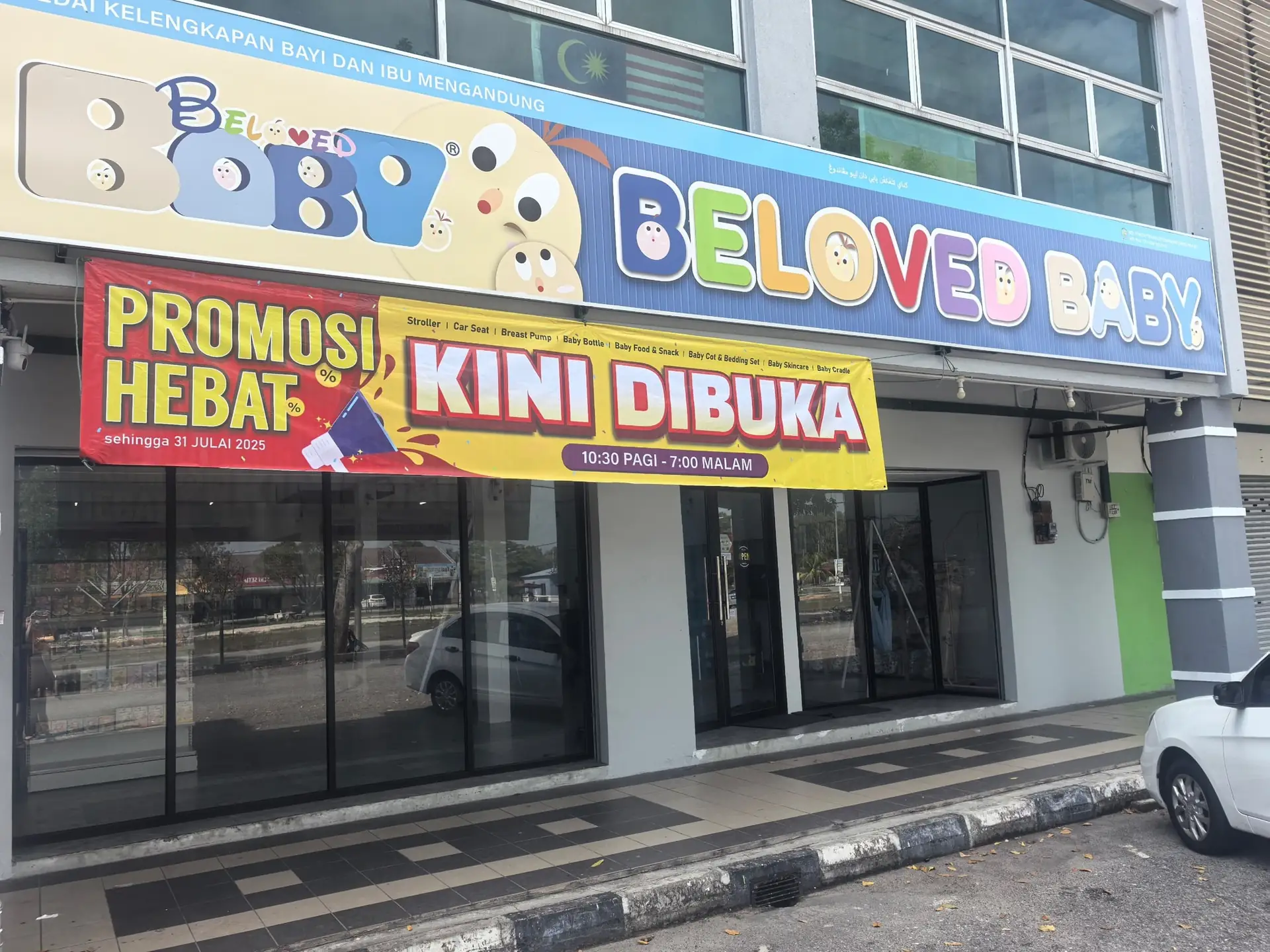 Beloved Baby Carousel baby care ad: Announcement ad: a new Perak baby store now open with a promo, frame 1 of 6
