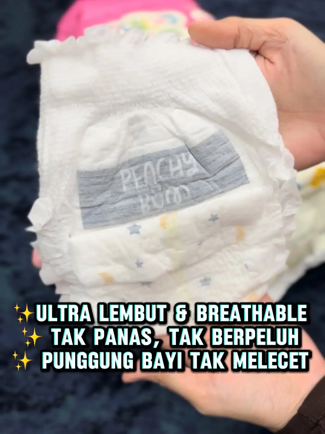Peachy Bum Malaysia Carousel baby care ad: Curiosity-hook ad: parents, want truly comfortable diapers?, frame 4 of 5
