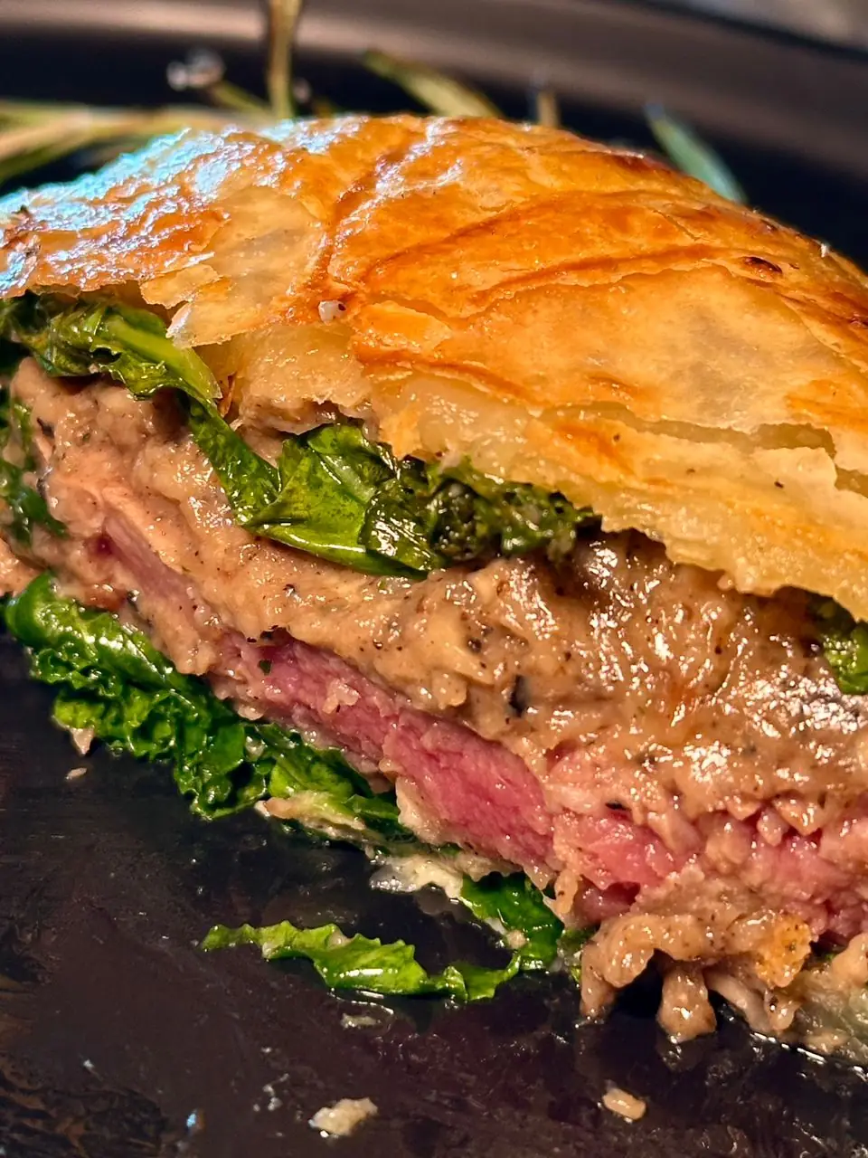 The Ocean Peak Carousel food and beverage ad: Showcase ad for a golden beef Wellington in glossy sauce, frame 6 of 6