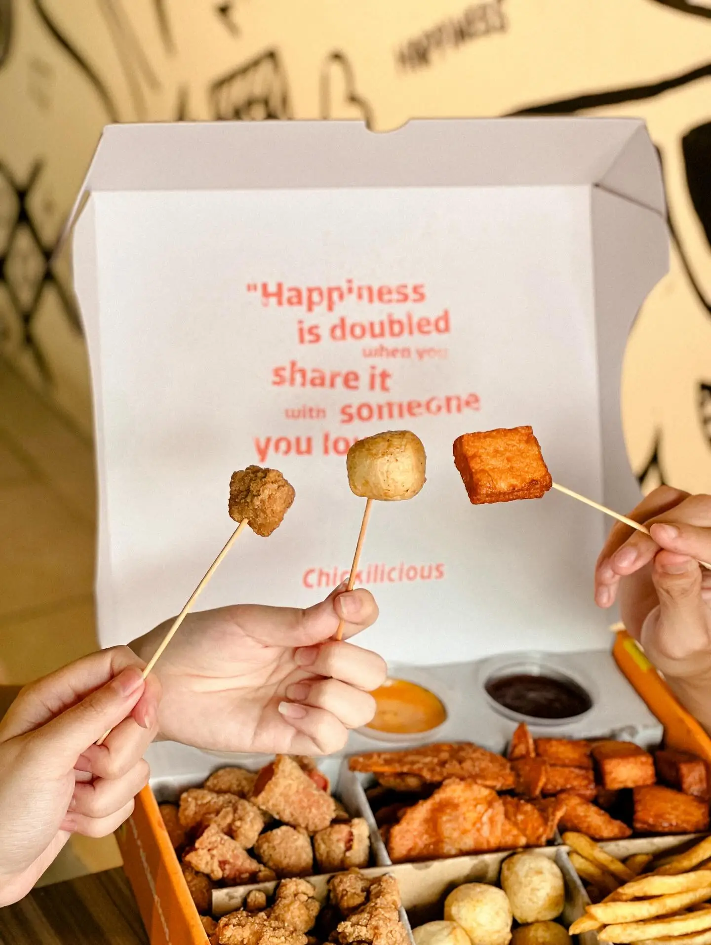 Chickilicious Carousel food and beverage ad: Lifestyle ad for sharing a snack box with someone you love, frame 4 of 5