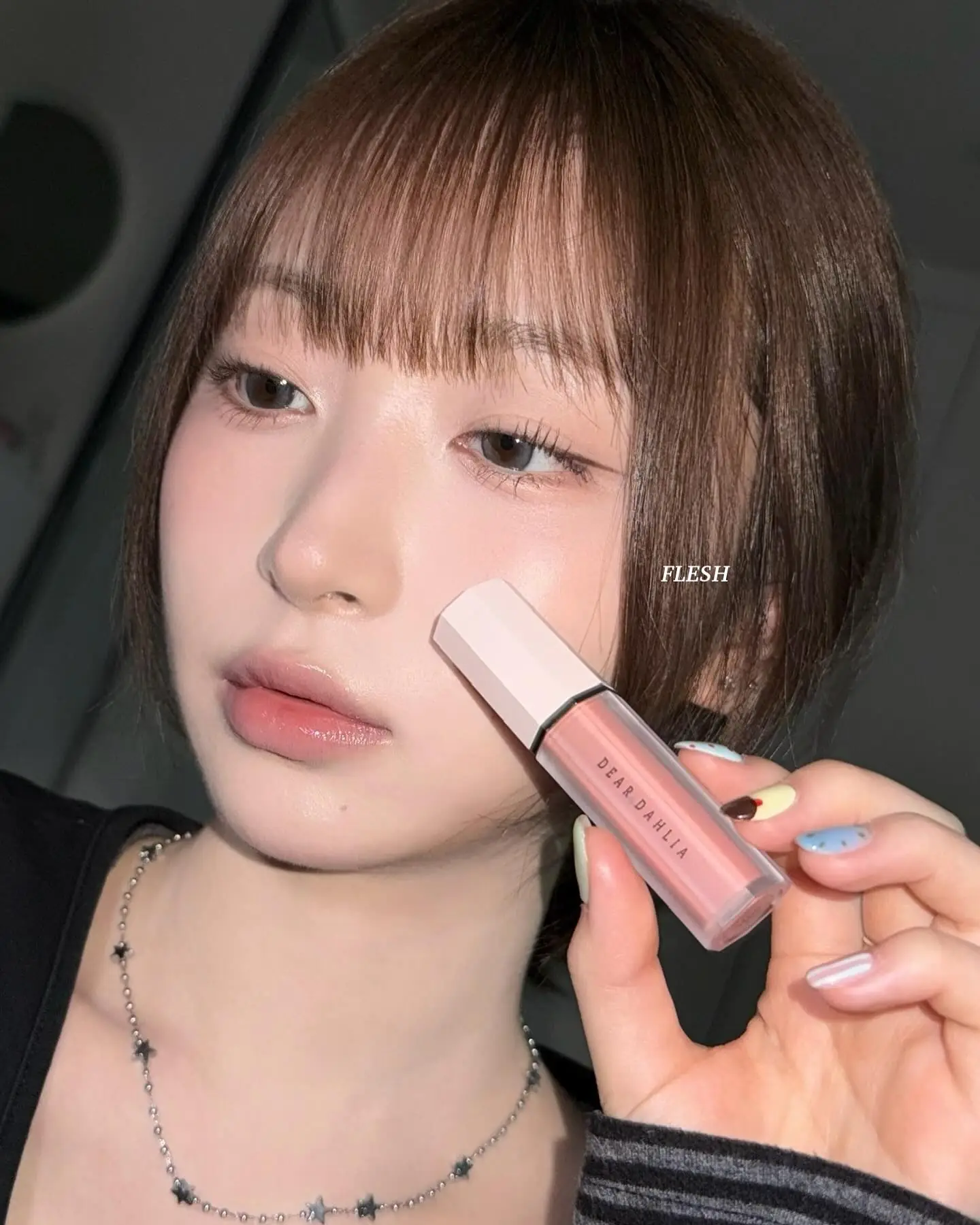 Dear Dahlia Carousel makeup and cosmetics ad: Founder-or-UGC ad for Dear Dahlia liquid blush in shade Flesh, frame 1 of 6