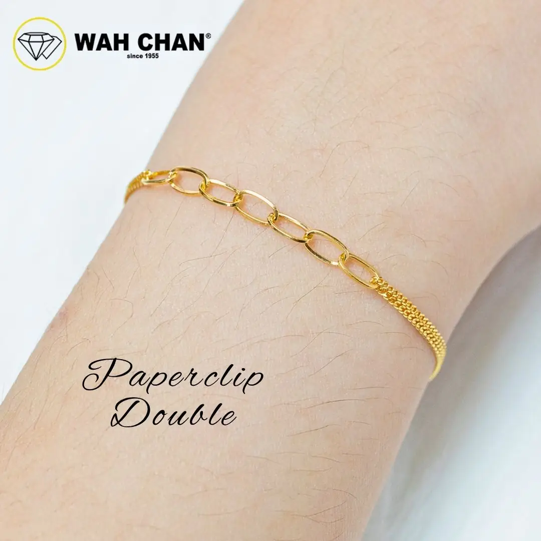Wah Chan Gold & Jewellery Carousel jewellery and watches ad: Showcase ad for the Grape Cube Anchor Chain gold bracelet on wrist, frame 4 of 6