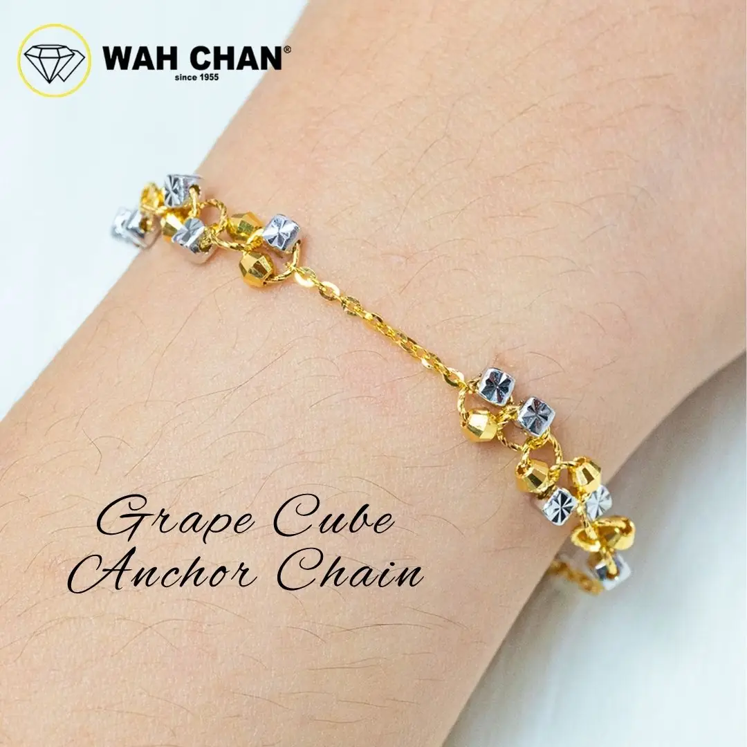 Wah Chan Gold & Jewellery Carousel jewellery and watches ad: Showcase ad for the Grape Cube Anchor Chain gold bracelet on wrist, frame 1 of 6