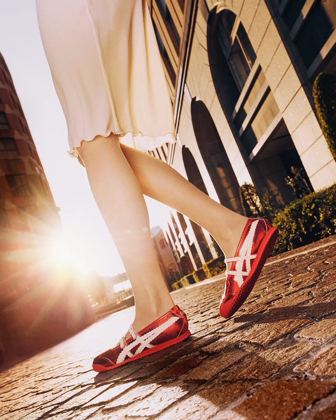 Onitsuka Tiger Static fashion ad: Showcase ad for the heritage red Mexico 66 sneaker on the street